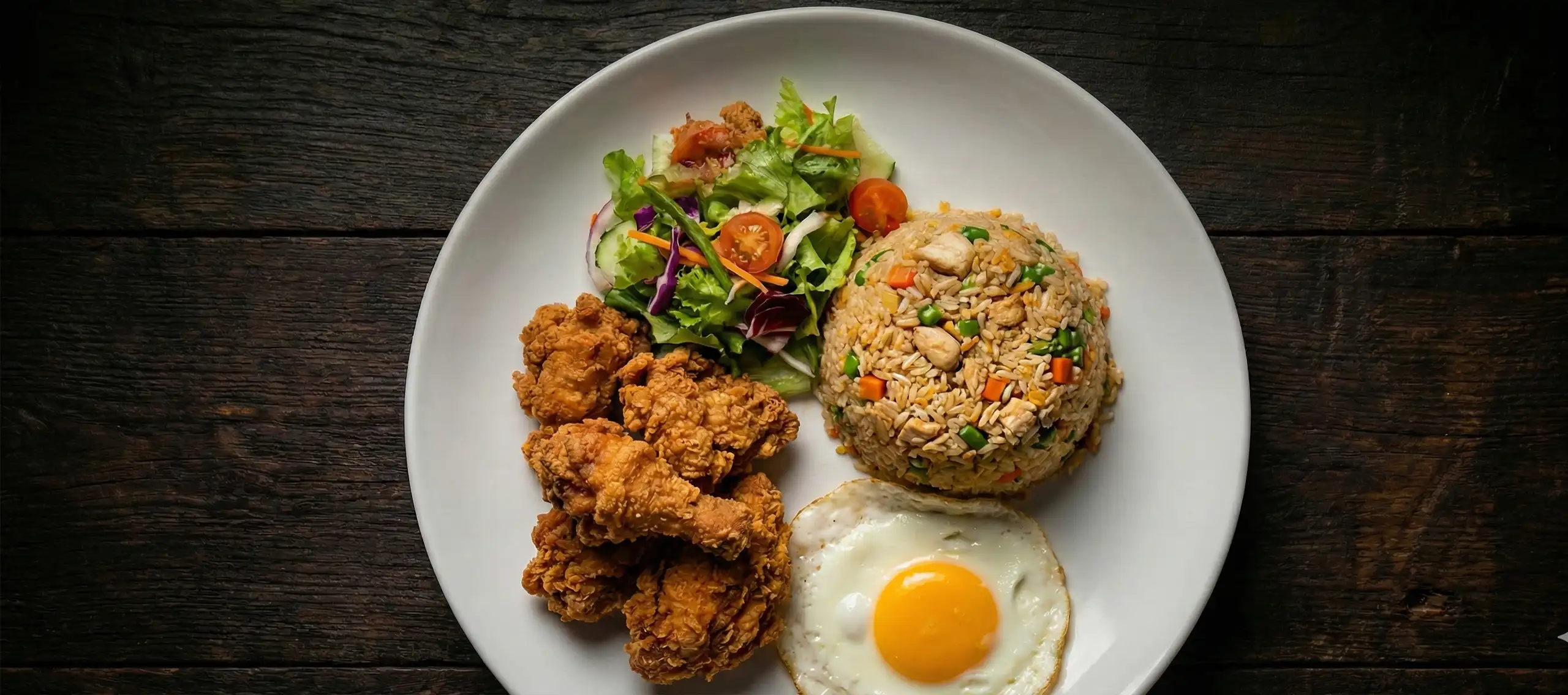 Crispy Fried Chicken with Fried Rice, Egg, and Fresh Salad